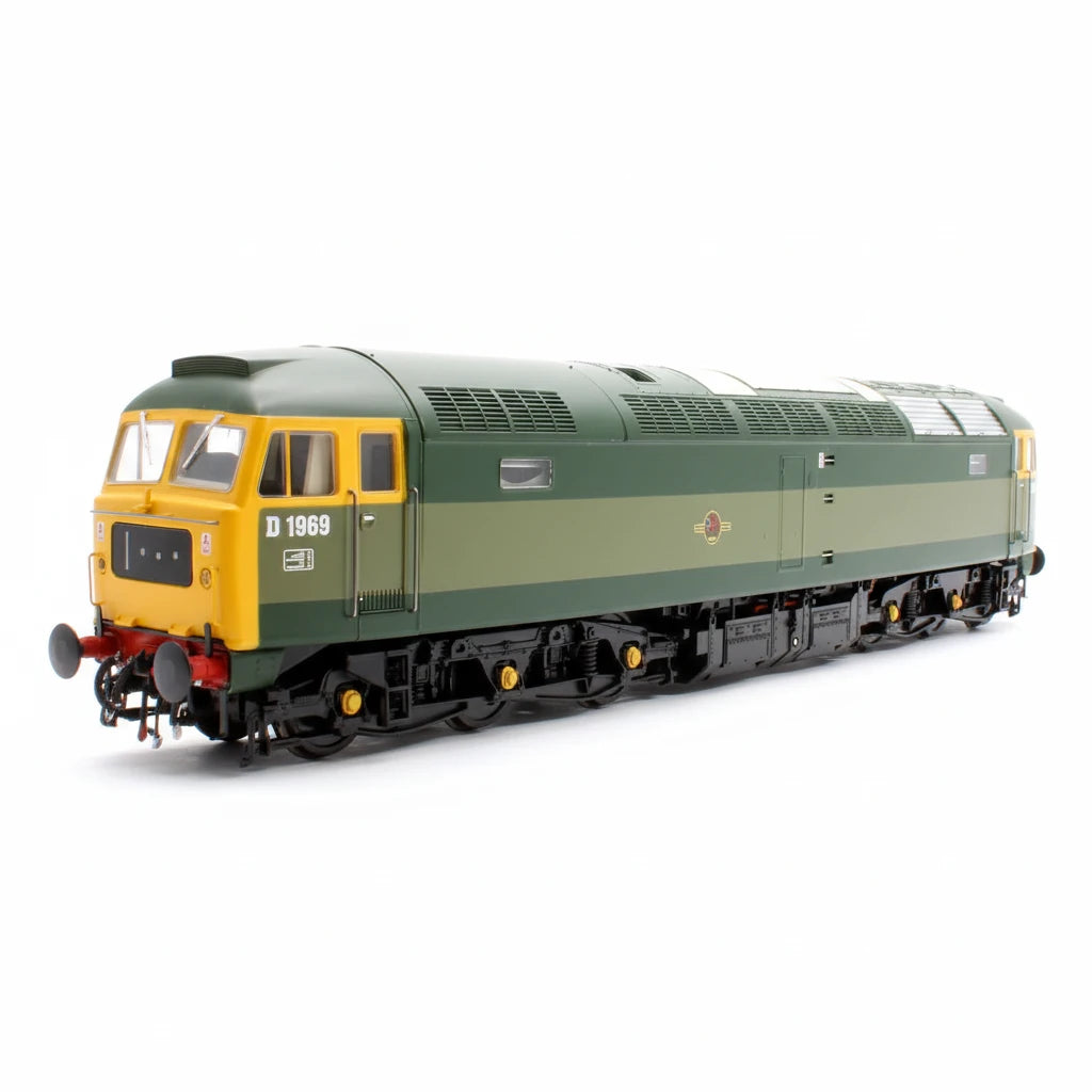 Model train in green and yellow livery on a white background